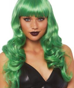 Woman wearing long wavy green wig